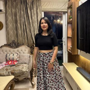 women's black crop top with printed flared skirt